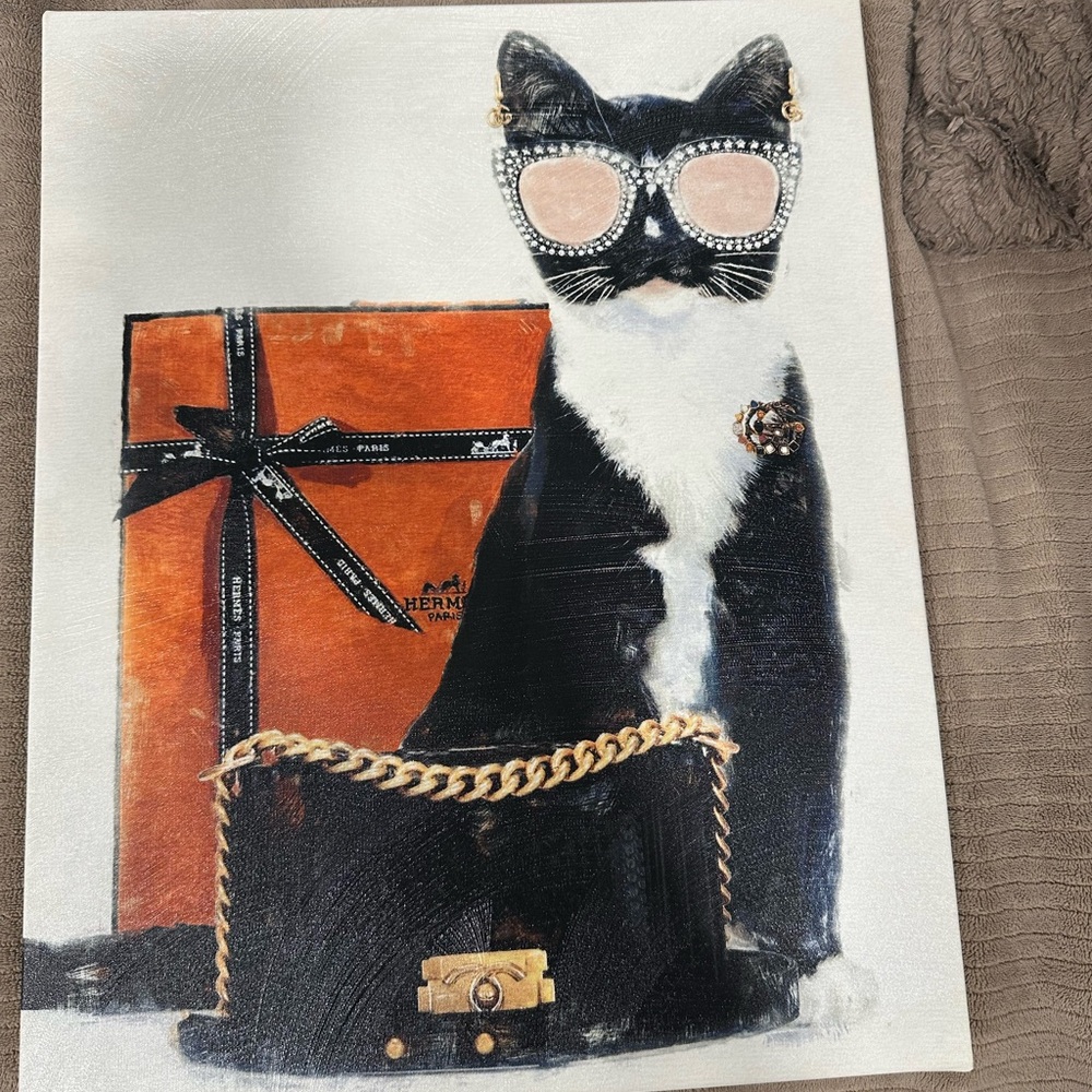 CHANEL Black and White Cat with Gold Accessories